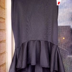 Black pencil skirt with ruffle bottom